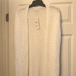 Off white, very short sleeved, long sweater duster